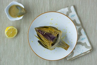 Тушенные артишоки с лимонным маслом