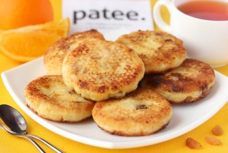 Апельсиновые сырники с изюмом