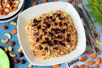 Слоёный салат с консервированной рыбой и орехами