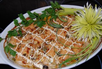 Филе пангасиуса под сыром на овощах