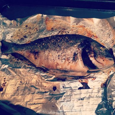 Дорада запеченая