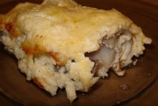 Минтай, тушеный в сметане