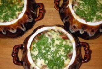 Курица с апельсинами в горшочке.