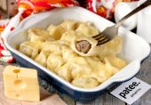 Пельмени под сыром в духовке