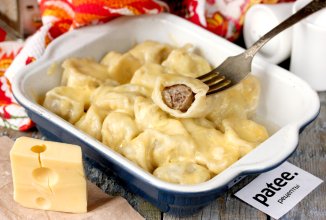 Пельмени под сыром в духовке