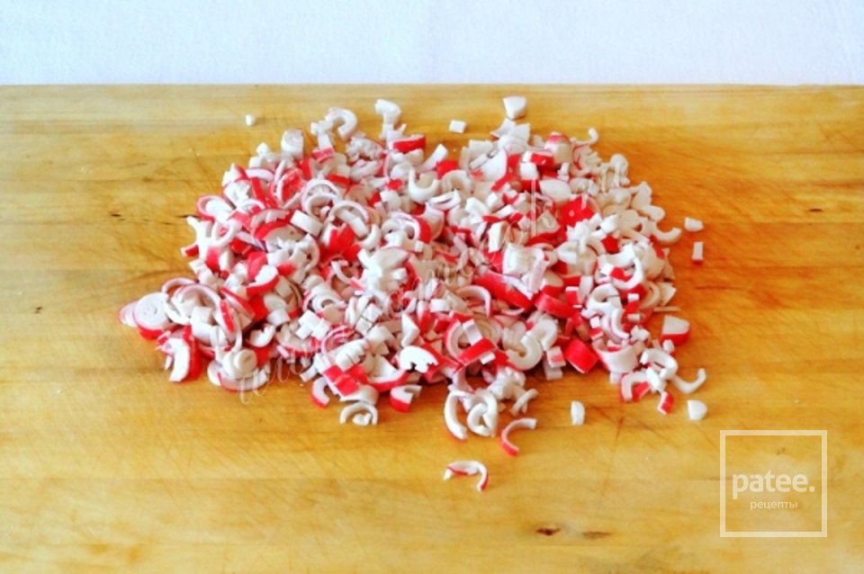 Крабовый салат в апельсинах - Шаг 2