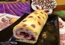 Cake roll with blackcurrant and sour cream filling
