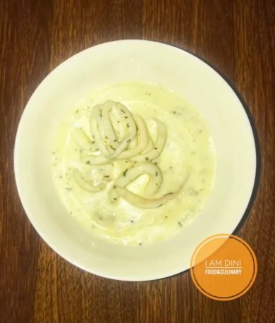 Кальмары в сливочном соусе